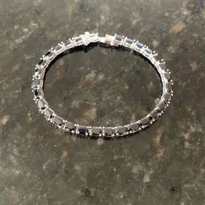 See Berkeley Jewelry Sterling and oval Black Onyx tennis bracelet 7”